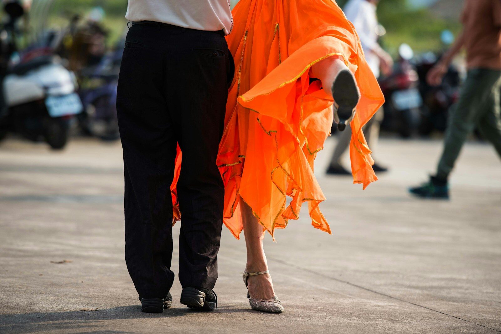 a man and woman holding hands